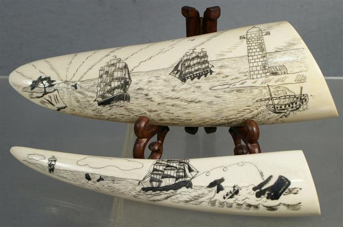 Two assorted ivory Scrimshaw tusks,