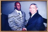 TWO AUTOGRAPHED PHOTOS OF MICH