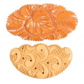 TWO BAKELITE PINS, CREAM AND T