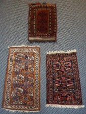 TWO BELOUCHISTAN RUGS AND PILL