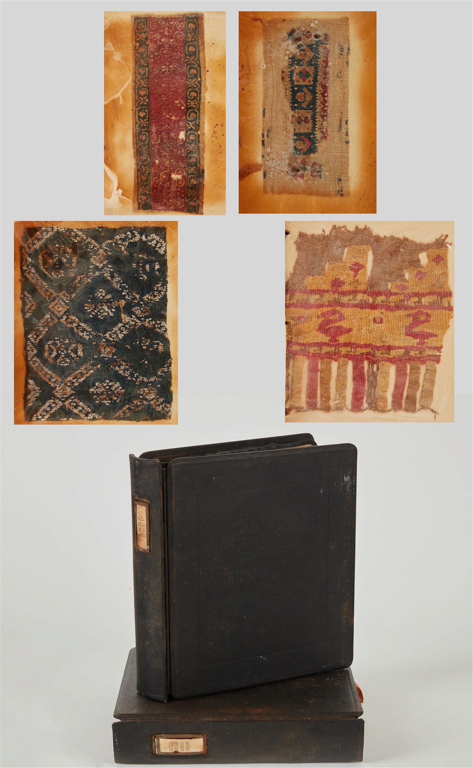 TWO BINDERS OF TEXTILE SAMPLES,