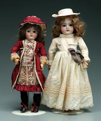 Two bisque head dolls, both with