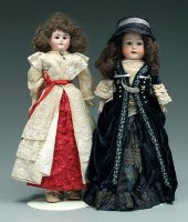 Two bisque head dolls: one Heu