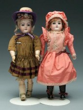 Two bisque head dolls: one Sim
