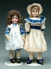Two bisque head dolls: one wit