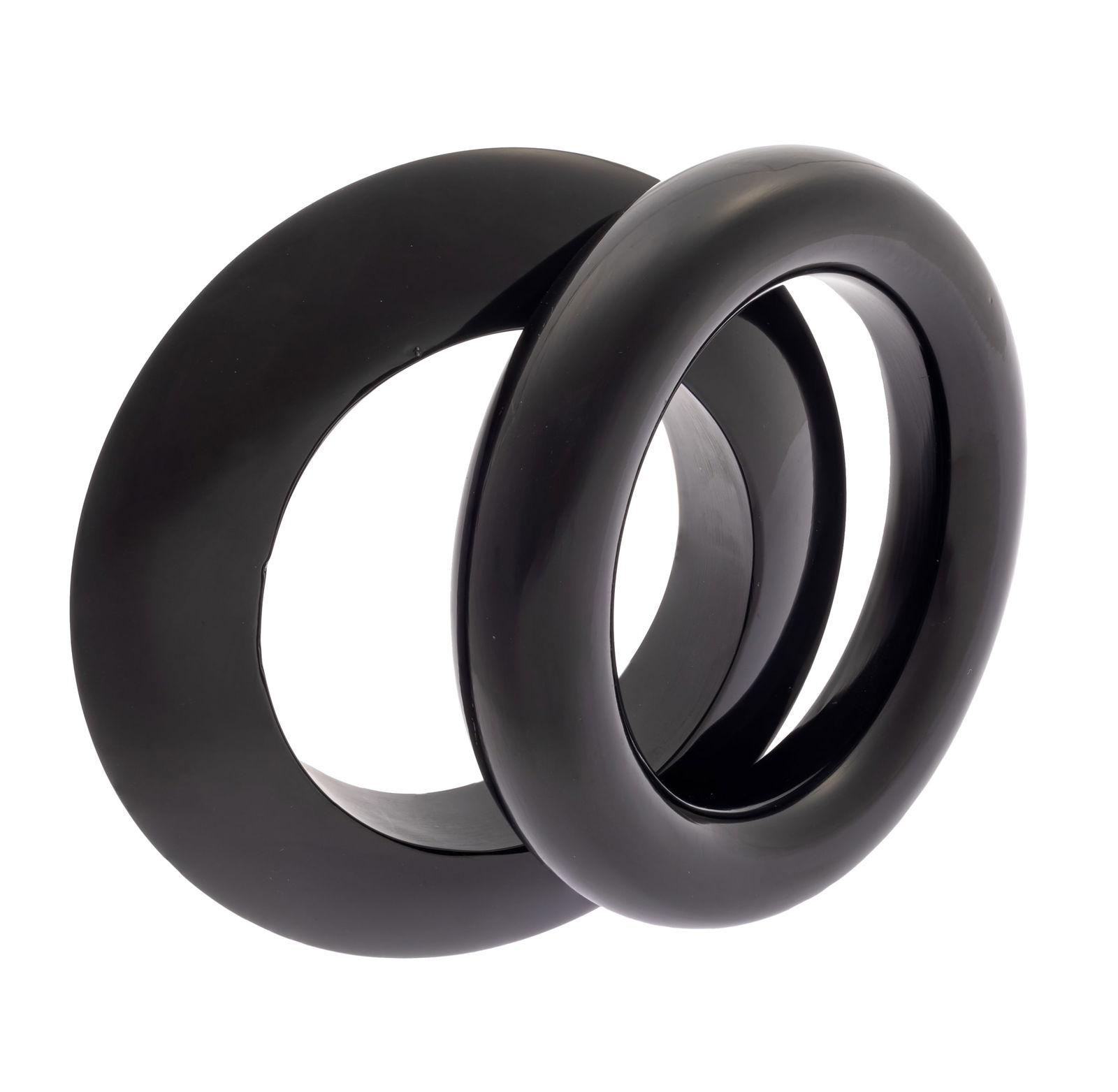 TWO BLACK ACRYLIC BANGLE BRACELETS,