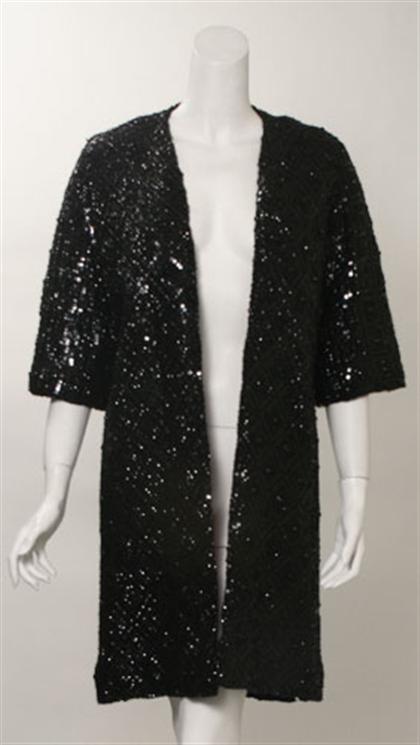 Two black beaded evening coats   