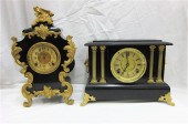 TWO BLACK CASED AMERICAN MANTE
