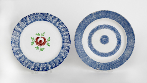 Two blue spatter plates with