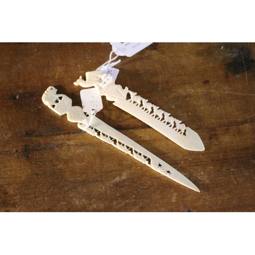 Two bone letter openers, approx