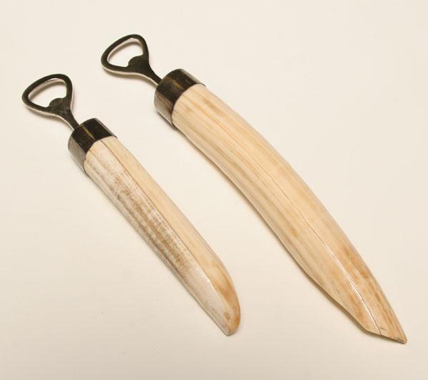 Two bottle openers with ivory