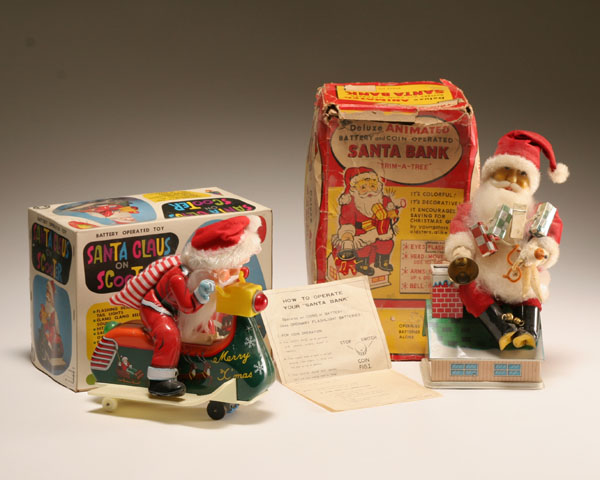 Two boxed Japanese vintage tin