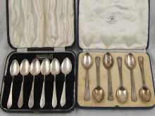 Two boxed sets of six silver