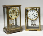 TWO BRASS AND GLASS CARRIAGE C