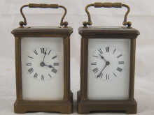 Two brass carriage clocks each