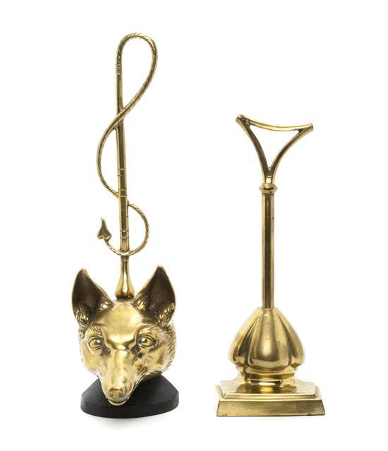 Two Brass Door Stops one