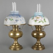 Two brass Rayo lamps with obve