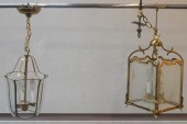 TWO BRASS-TONE AND GLASS HANGI