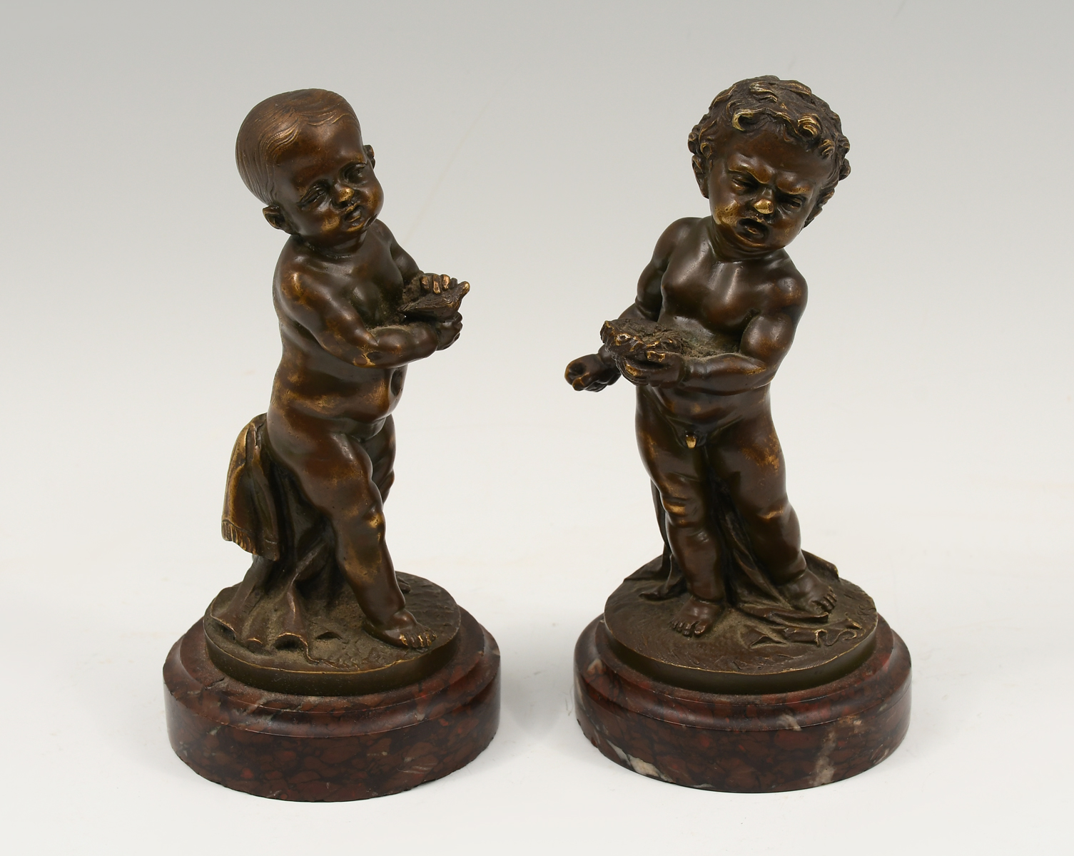 TWO BRONZE BABY SCULPTURES BY