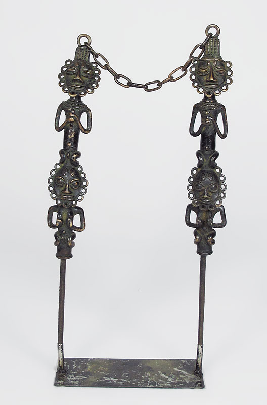 TWO BRONZE FIGURAL SPEAR TOTEMS
