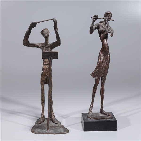 Two bronze figures, conductor and