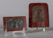 TWO BRONZE PLAQUES DEPICTING M