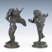 TWO BRONZE PUTTI SCULPTURES 10