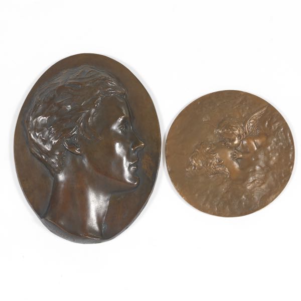 TWO BRONZE WALL PLAQUES  One