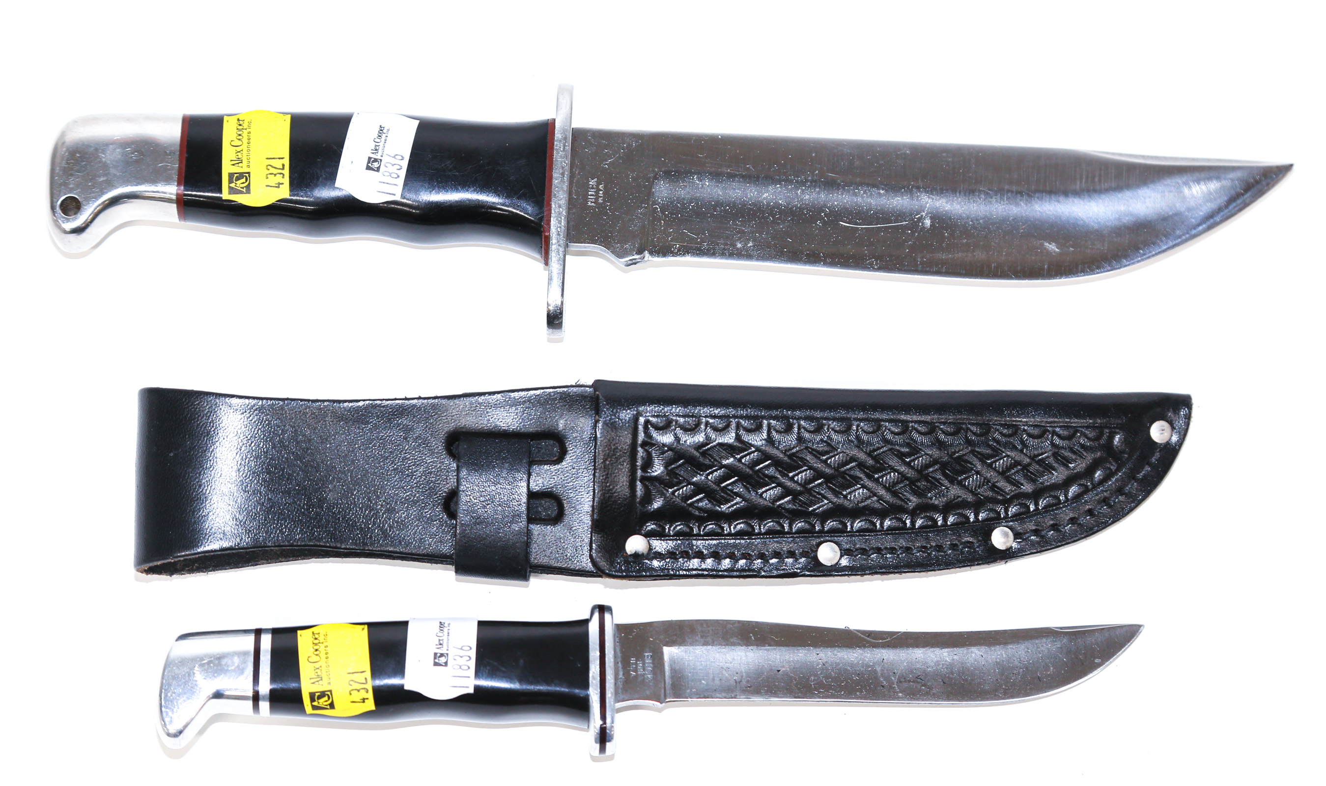 TWO BUCK KNIVES One with sheath,