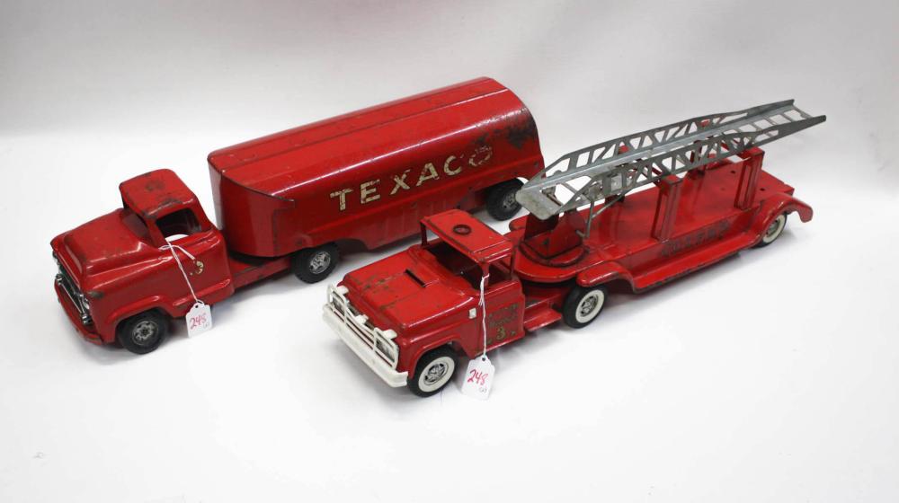 TWO BUDDY L TOY TRUCKS. THE FIRST A