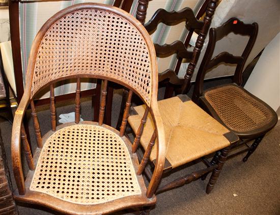 Two cane seat chairs and a