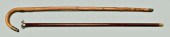 Two canes, saw and light meter