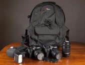TWO CANON CAMERAS WITH ACCESSO