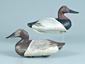 Two canvasback decoys: one wit