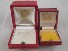 Two Cartier ring boxes 4 x 4 x 5