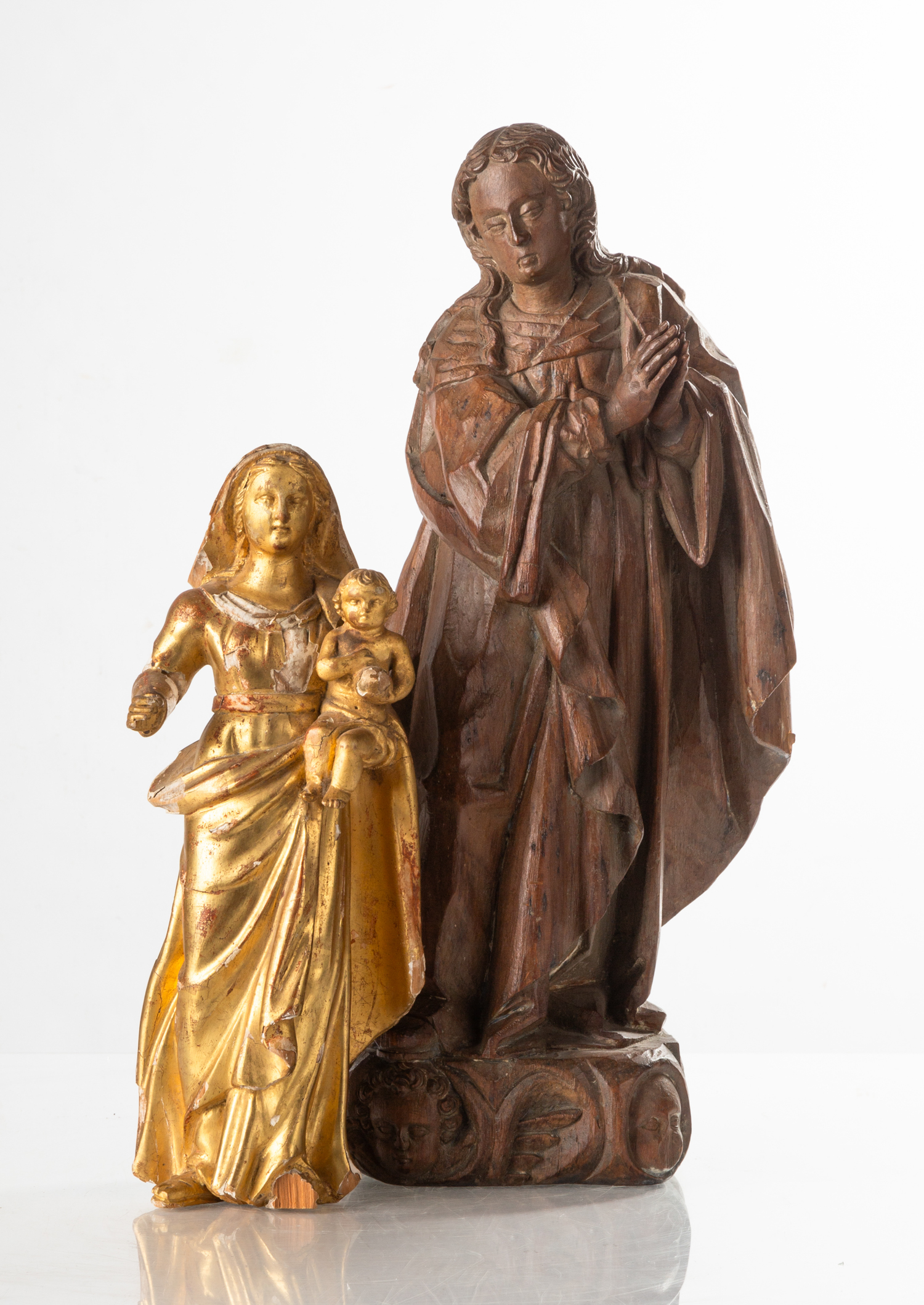TWO CARVED AND GILTWOOD ICONS