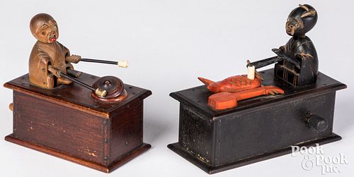 TWO CARVED AND PAINTED WOOD