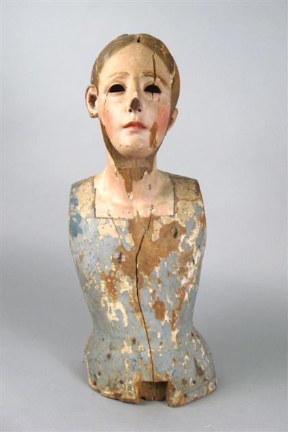 Two carved and painted wood