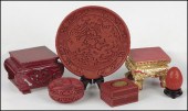 TWO CARVED CINNABAR BOXES. Tog