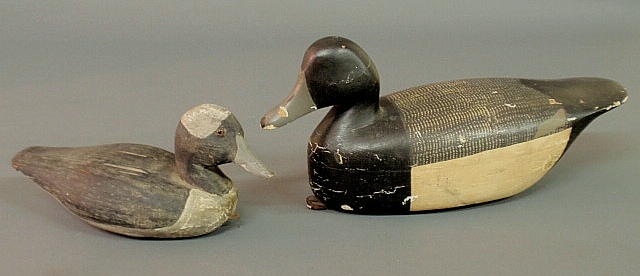 Two carved duck decoys large one