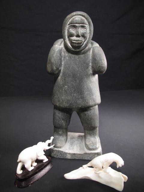 Two carved ivory figurines and
