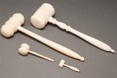 Two carved ivory gavels and tw