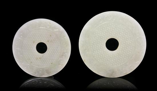Two Carved Jade Bi both having