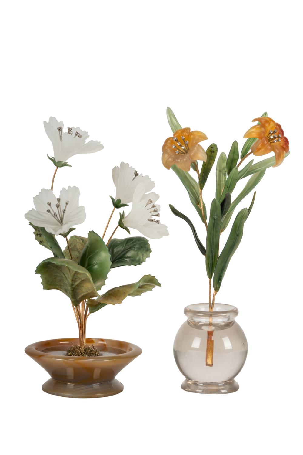 TWO CARVED STONE FLOWER