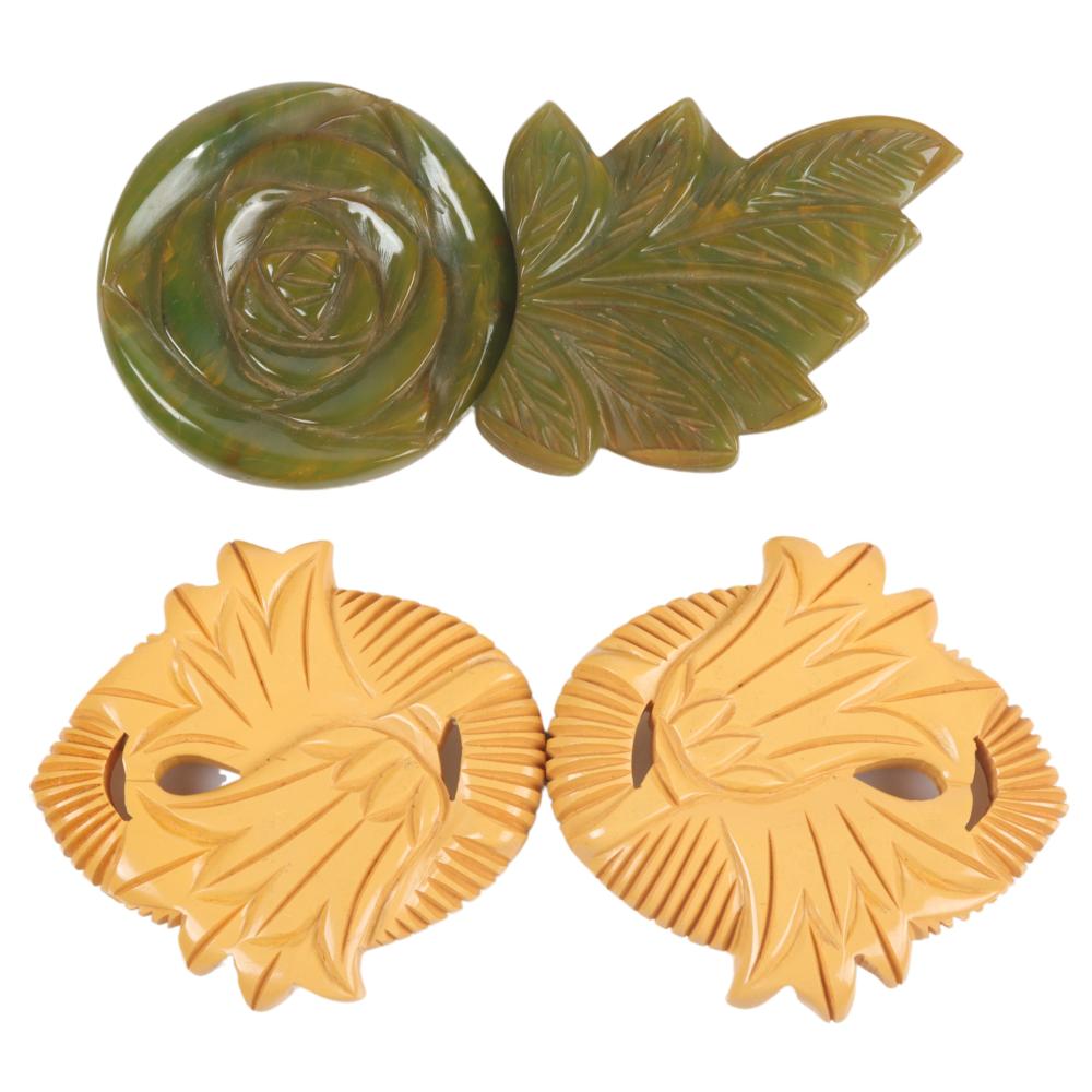 TWO CARVED VINTAGE BAKELITE