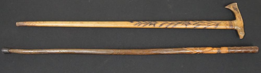 TWO CARVED WOOD CANESTwo Carved