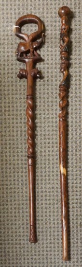 TWO CARVED WOOD WALKING STICKS