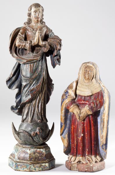 Two Carved Wooden Santos