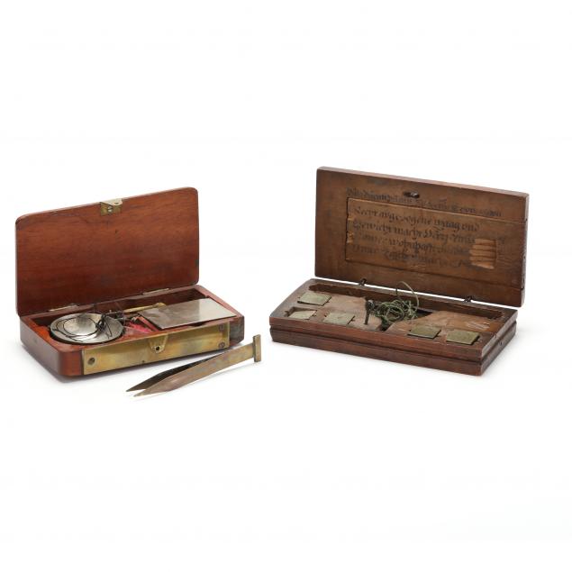 TWO CASED MERCHANT COIN SCALES WITH
