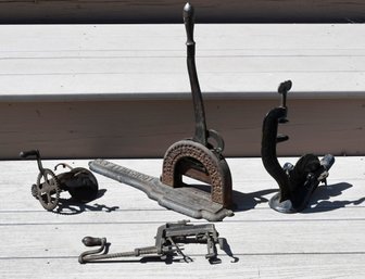 Two cast iron apple peelers dated